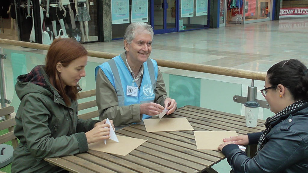 Making origami peace doves